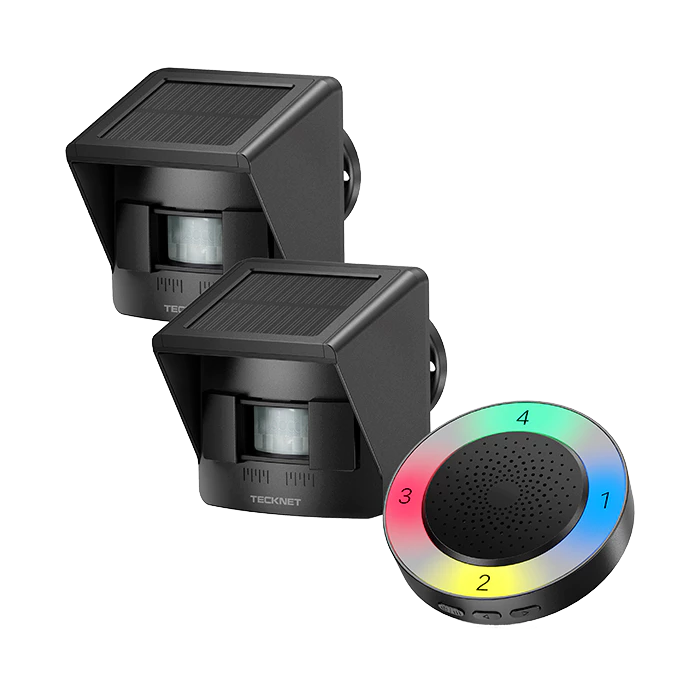 Two black solar-powered LED light fixtures and a colorful circular device on a white background.